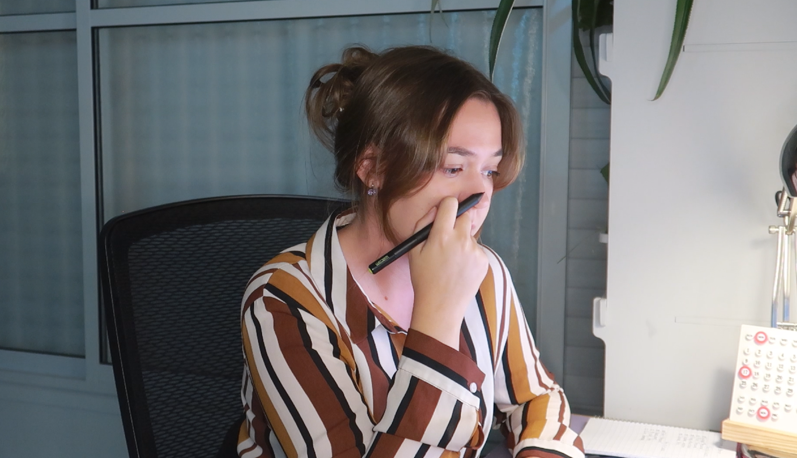 Working through an early screen at the desk